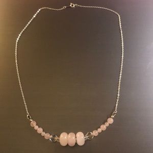 Original rose quarts necklace with a silver chain.